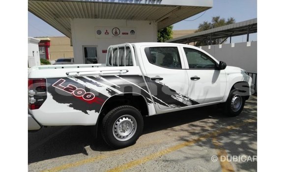 Buy Import Mitsubishi L200 White Car in Import - Dubai in Agalega Islands Buy Import Mitsubishi L200 White Car in Import - Dubai in Agalega Islands