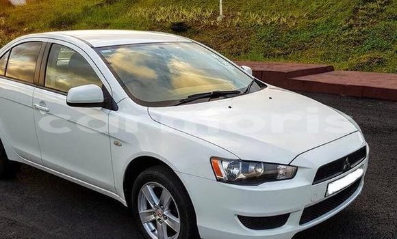 Buy Used Mitsubishi Lancer White Car in Moka in Moka