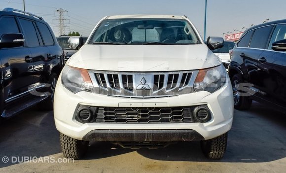 Buy Import Mitsubishi L200 White Car in Import - Dubai in Agalega Islands Buy Import Mitsubishi L200 White Car in Import - Dubai in Agalega Islands
