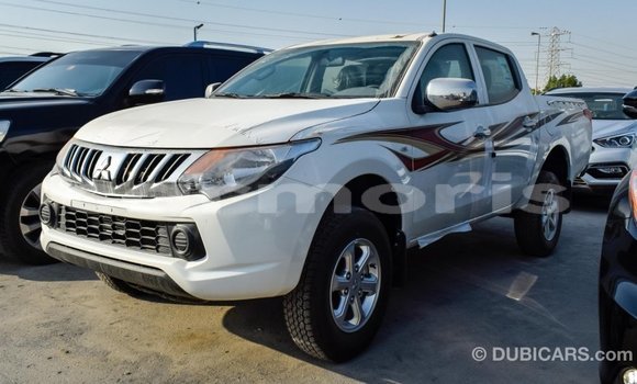 Buy Import Mitsubishi L200 White Car in Import - Dubai in Agalega Islands Buy Import Mitsubishi L200 White Car in Import - Dubai in Agalega Islands
