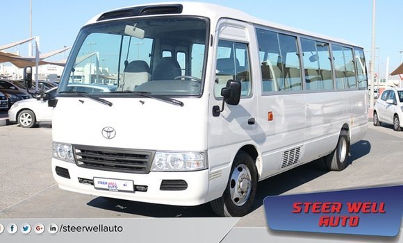 Buy Import Toyota Coaster White Car in Import - Dubai in Agalega Islands Buy Import Toyota Coaster White Car in Import - Dubai in Agalega Islands