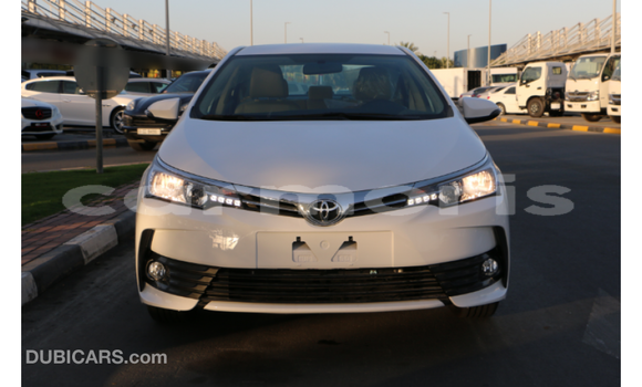 Buy Import Toyota Corolla White Car in Import - Dubai in Agalega Islands Buy Import Toyota Corolla White Car in Import - Dubai in Agalega Islands