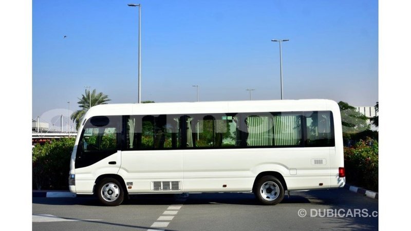 Big with watermark toyota coaster agalega islands import dubai 2821
