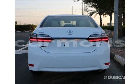 Buy Import Toyota Corolla White Car in Import - Dubai in Agalega Islands Buy Import Toyota Corolla White Car in Import - Dubai in Agalega Islands
