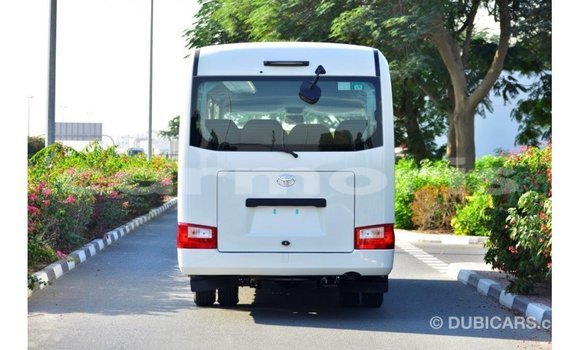 Buy Import Toyota Coaster White Car in Import - Dubai in Agalega Islands Buy Import Toyota Coaster White Car in Import - Dubai in Agalega Islands