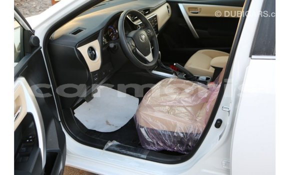Buy Import Toyota Corolla White Car in Import - Dubai in Agalega Islands Buy Import Toyota Corolla White Car in Import - Dubai in Agalega Islands