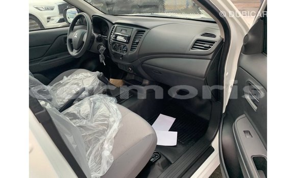 Buy Import Mitsubishi L200 White Car in Import - Dubai in Agalega Islands Buy Import Mitsubishi L200 White Car in Import - Dubai in Agalega Islands