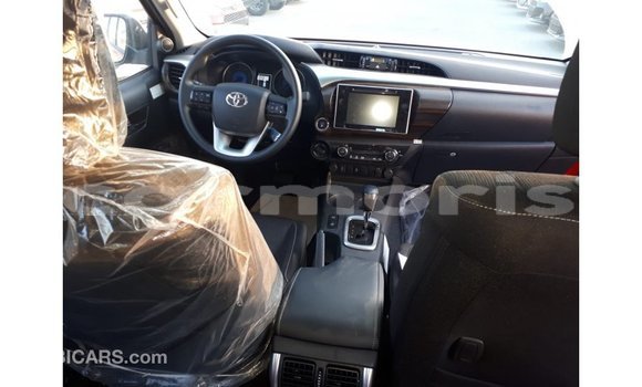 Buy Import Toyota Hilux Red Car in Import - Dubai in Agalega Islands Buy Import Toyota Hilux Red Car in Import - Dubai in Agalega Islands