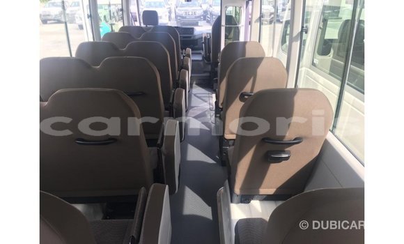 Buy Import Toyota Coaster White Car in Import - Dubai in Agalega Islands Buy Import Toyota Coaster White Car in Import - Dubai in Agalega Islands