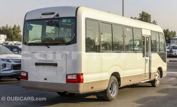 Buy Import Toyota Coaster White Car in Import - Dubai in Agalega Islands Buy Import Toyota Coaster White Car in Import - Dubai in Agalega Islands