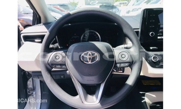 Buy Import Toyota Corolla White Car in Import - Dubai in Agalega Islands Buy Import Toyota Corolla White Car in Import - Dubai in Agalega Islands