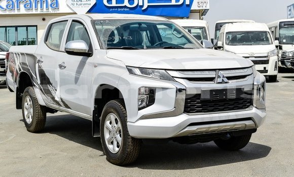 Buy Import Mitsubishi L200 White Car in Import - Dubai in Agalega Islands Buy Import Mitsubishi L200 White Car in Import - Dubai in Agalega Islands
