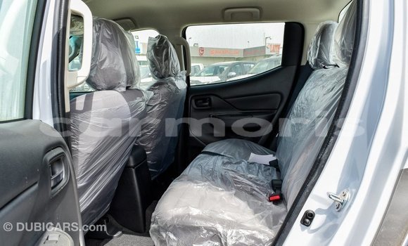 Buy Import Mitsubishi L200 White Car in Import - Dubai in Agalega Islands Buy Import Mitsubishi L200 White Car in Import - Dubai in Agalega Islands