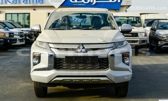 Buy Import Mitsubishi L200 White Car in Import - Dubai in Agalega Islands Buy Import Mitsubishi L200 White Car in Import - Dubai in Agalega Islands