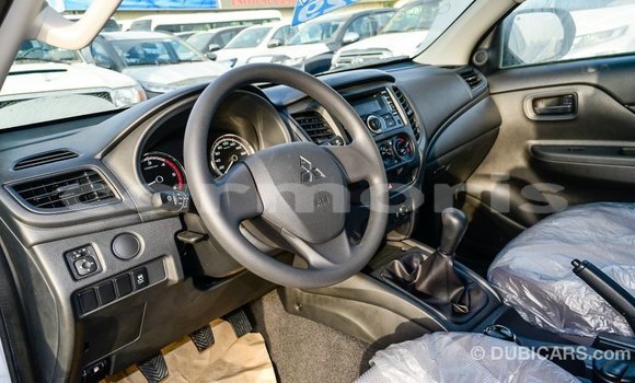 Buy Import Mitsubishi L200 White Car in Import - Dubai in Agalega Islands Buy Import Mitsubishi L200 White Car in Import - Dubai in Agalega Islands
