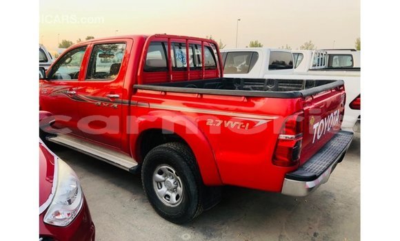 Buy Import Toyota Hilux Red Car in Import - Dubai in Agalega Islands Buy Import Toyota Hilux Red Car in Import - Dubai in Agalega Islands