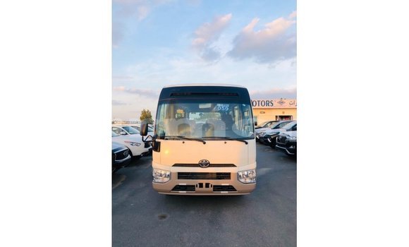 Buy Import Toyota Coaster White Car in Import - Dubai in Agalega Islands