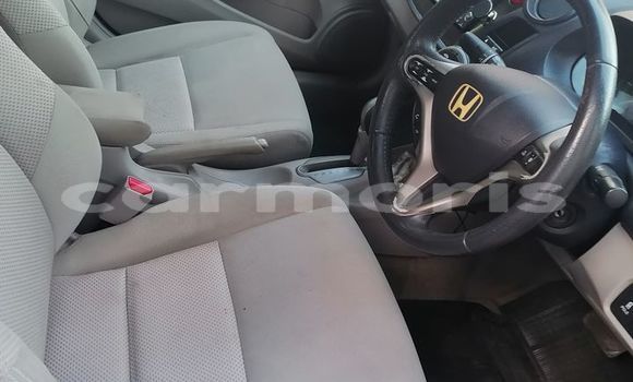 Buy Used Honda Insight Red Car in Port Louis in Port Louis District Buy Used Honda Insight Red Car in Port Louis in Port Louis District