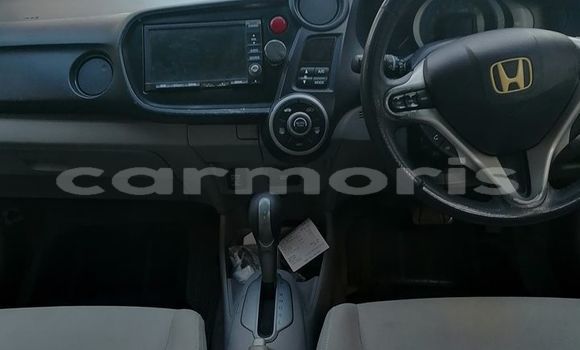 Buy Used Honda Insight Red Car in Port Louis in Port Louis District Buy Used Honda Insight Red Car in Port Louis in Port Louis District