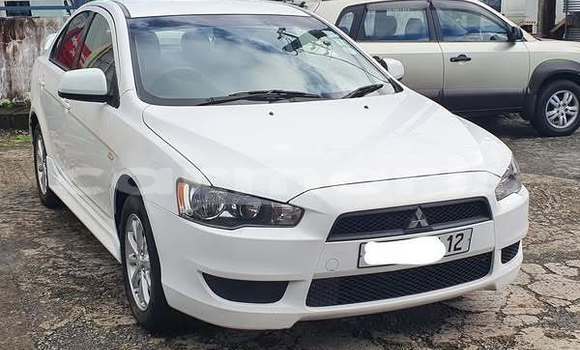 Buy Used Mitsubishi Lancer White Car in Baie du Tombeau in Pamplemousses District