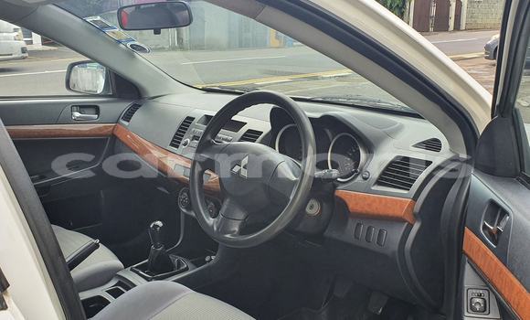 Buy Used Mitsubishi Lancer White Car in Baie du Tombeau in Pamplemousses District Buy Used Mitsubishi Lancer White Car in Baie du Tombeau in Pamplemousses District