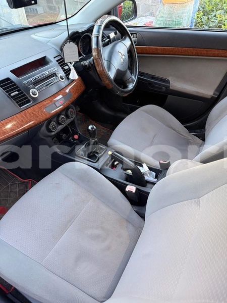 Big with watermark mitsubishi lancer evolution grand port district rose belle 7931