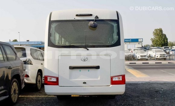 Buy Import Toyota Coaster White Car in Import - Dubai in Agalega Islands Buy Import Toyota Coaster White Car in Import - Dubai in Agalega Islands